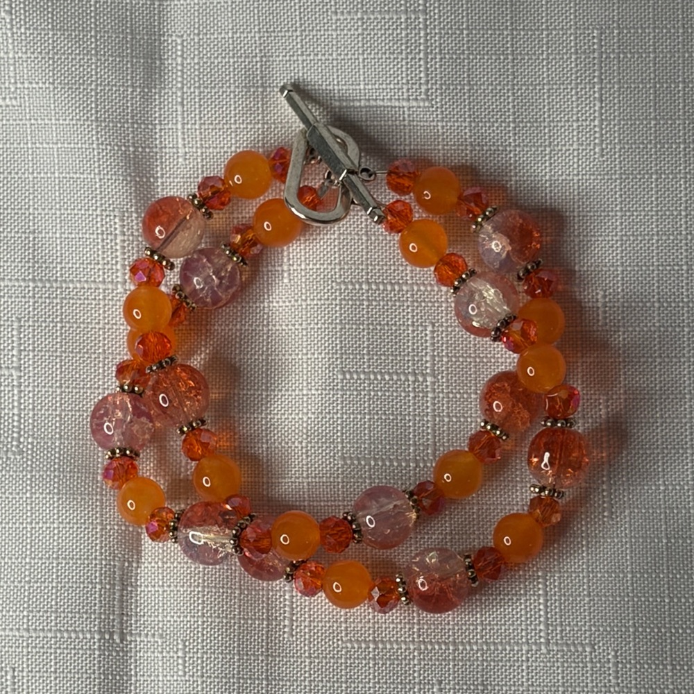 Handcrafted “The Orange Bracelet” Sz 7.5”